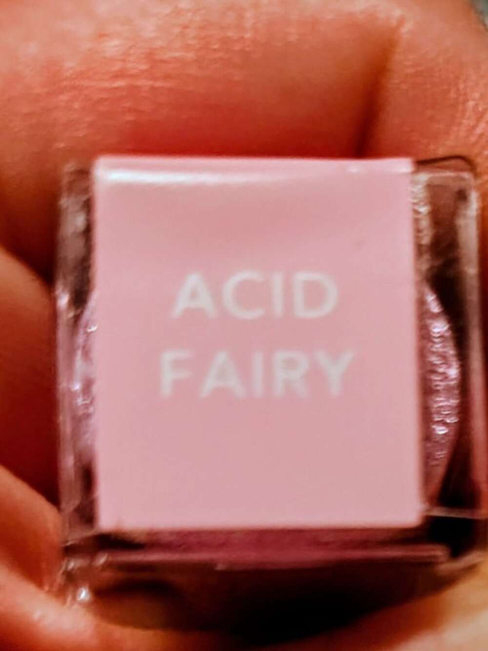 The Lime Crime Diamond Crushers Iridescent Lip Topper in shade Acid Fairy